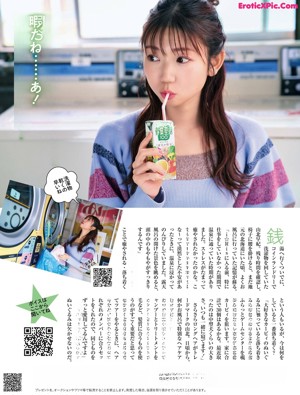 A woman standing in front of a vending machine.