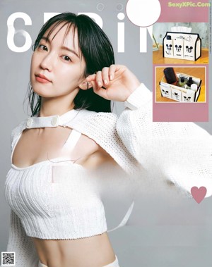 A woman sitting on the cover of a magazine.